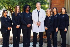 Claxton Smiles Youth Dentistry team photo outside